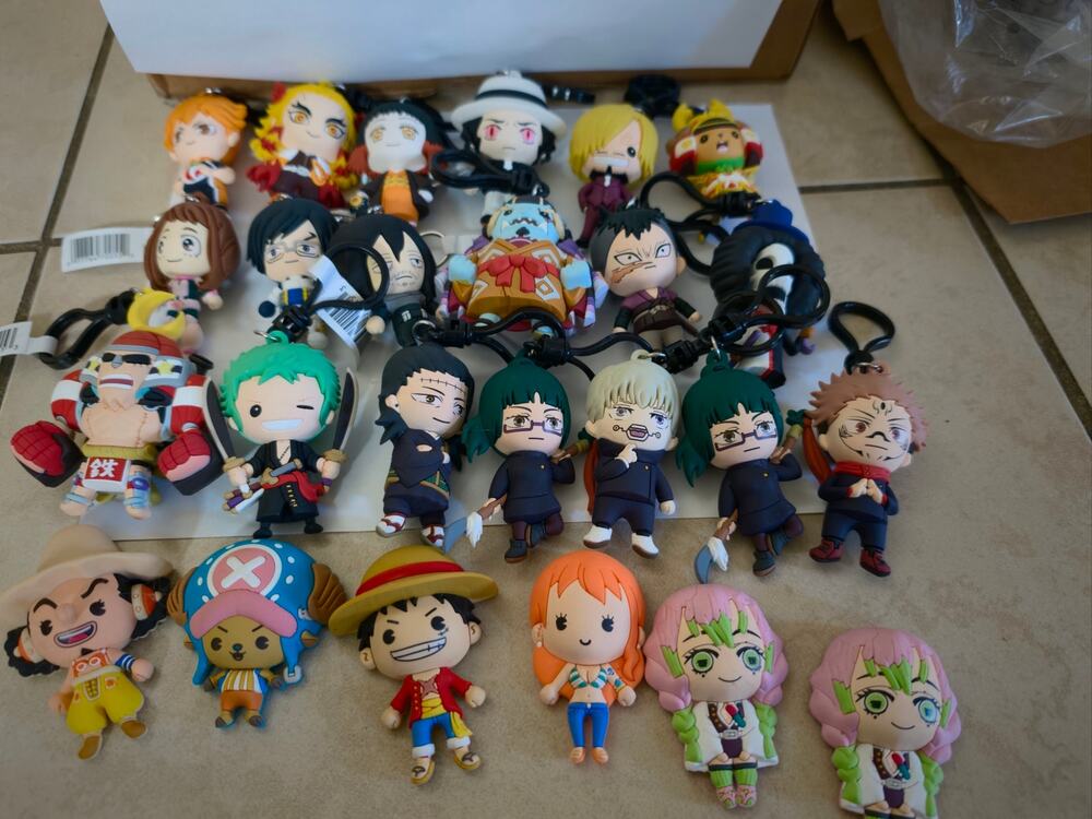 Assorted anime monogram bag clips and magnets popular anime lot